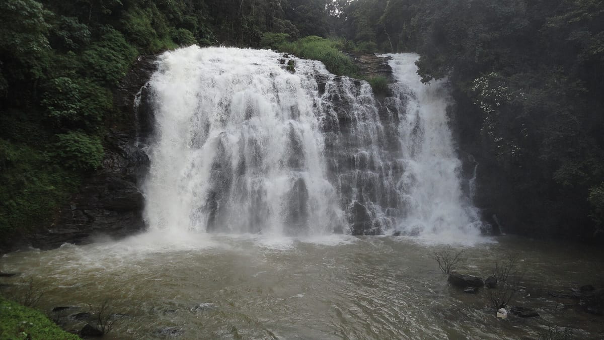 Abbey Falls surrounded by forest in Coorg, Karnataka